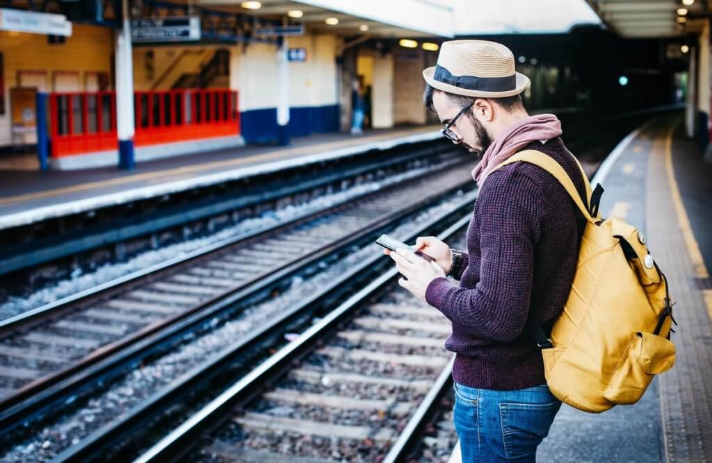 Travel Man Wearing Layers of Clothes