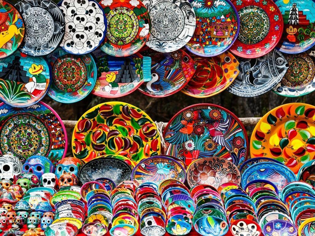 Buy Local Souvenirs like these colourful plates